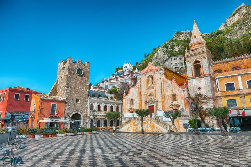 Piazza IX Aprile in Taormina with its checkerboard paving and clock tower